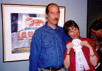 Becky and husband with 2003 prize ribbon